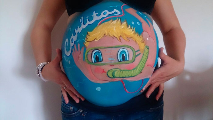 barriga embarazada pintada bebe buceador